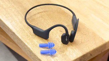 AfterShokz Xtrainerz side view with earplugs