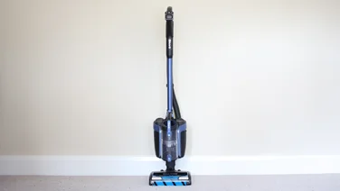 Shark vacuum ICZ300UKT against a wall