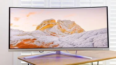 monitor on a wooden table