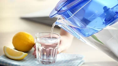 best water filter jug water being poured into a glass