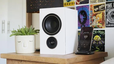 PSB Alpha iQ review - lifestyle shot of white speaker