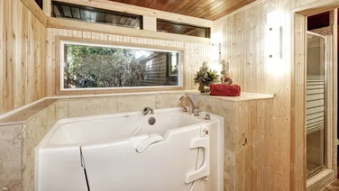 How do walk in bathtubs work - featured