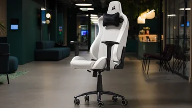 corsair tc200 gaming chair white full view to the right in a dark background