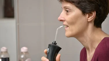 How to use a water flosser