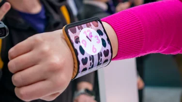 Motorola Adaptive Display Concept bendable phone wrapped around a woman's wrist