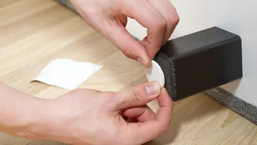 How to stop a bed squeaking someone adding circular pad to the leg of the bed