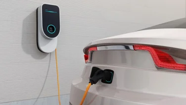 Close up of electric car being charged with an EV smart charger
