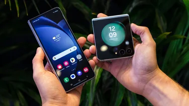 best foldable phone header left hand holding unfolded phone and right hand holding folded phone