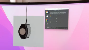 how we test monitors, screen with a pink background and a brightness monitor on it