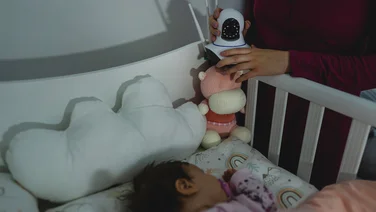 Are baby monitors safe from hackers header baby asleep in cot