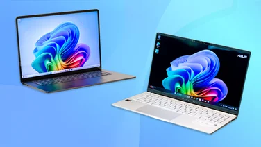 Microsoft Surface Laptop 7 15in vs Asus Vivobook S15 - featured. The Microsoft Surface Laptop 7 15in and the Asus Vivobook S15 laptops on a blue background