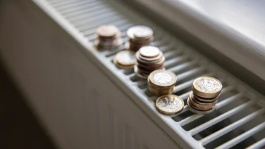 Image of coins on a radiator