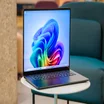 microsoft surface laptop 7 review laptop open on home screen positioned to the right
