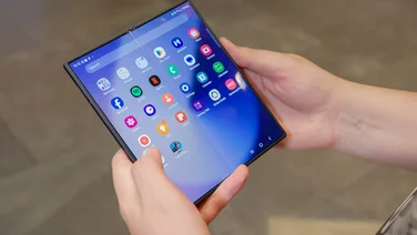 Samsung Galaxy Z Fold 6 hands-on review - featured. Hands holding the phone with screen unfolded to full size