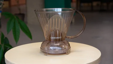 The Clever Dripper coffee maker on a table in an office