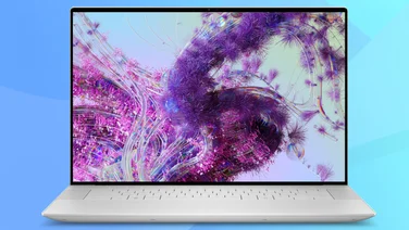 Front view of the Dell XPS 13 (9640) on a blue background