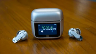 Image of the JBL Tour Pro 3 wireless earbuds and charging case