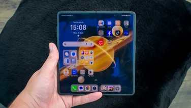 Honor Magic V3 in hand, unfolded with the internal display on