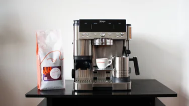 Ninja Luxe Cafe Premier review header coffee machine on a black worktop