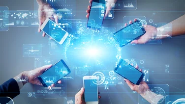 MVNO: What is a mobile virtual network showing mobile phone being held in a circle