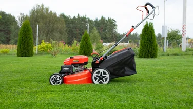 what is a self propelled lawn mower header mower on grass