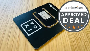 Black Voxi SIM card on a wooden table