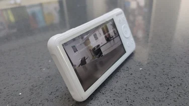 Momcozy BM01 review header angled front view on a grey worktop