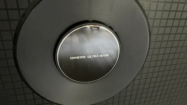 Close-up image of the subwoofer built into the back of the TCL Q9BK 4K TV