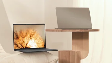 Asus' official press shot of the Zenbook A14 – open rear and front views