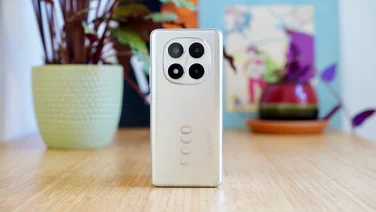 Xiaomi Poco X7 standing on desk, rear view