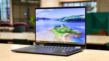 HP OmniBook Ultra Flip 14 from front right on a maple wood worktop