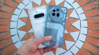 Nothing Phone (3a) and Phone (3a) Pro in hand, rear view