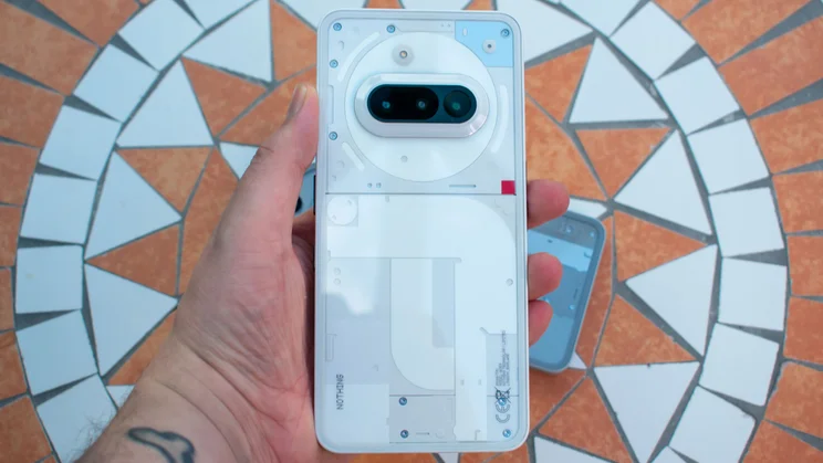 Nothing Phone (3a) is hand, rear view