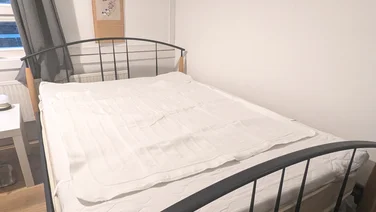 Silentnight Comfort Control Electric Blanket review_teaser blanket layed out on a black metal bed