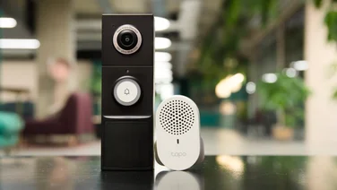 TP-Link Tapo D235 with chime on table