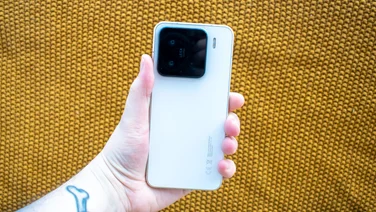 Xiaomi 15 in hand, rear view