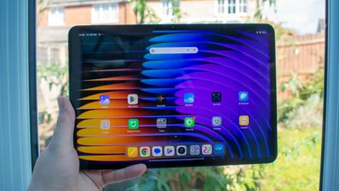 Xiaomi Pad 7 in hand with the display on