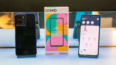 HMD Fusion X1 smartphone with its box and another HMD phone