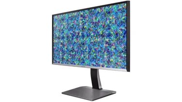 An angled view of the Samsung U32D970Q professional monitor