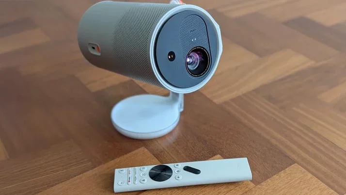 The XGIMI MoGo 4 Laser projector on a wooden floor