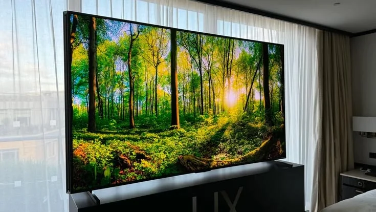 The 110in Hisense UXN in a hotel room