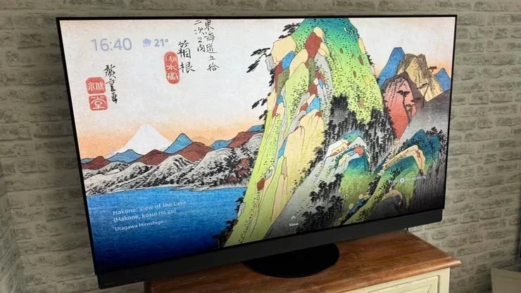 The Panasonic Z95B OLED on a table displaying a Japanese artwork