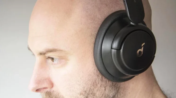 The Anker Soundcore Life Q30 over-ear headphones being worn by our reviewer