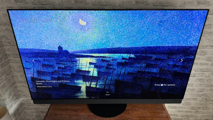 The Panasonic Z5B OLED on a wooden table
