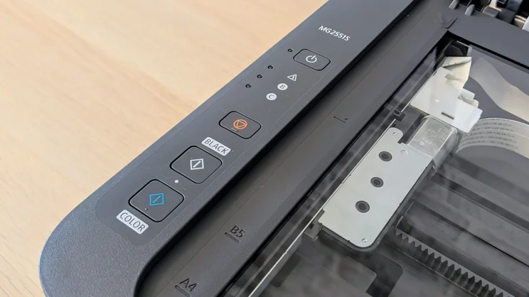 A close up of the Canon Pixma MG2551S' buttons and control panel