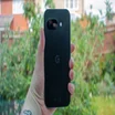 Google Pixel 9a in hand, rear view