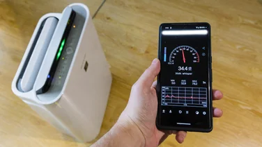 A smartphone running a sound meter app to measure dBA output of an air purifier
