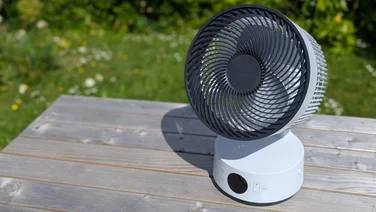 The MeacoFan Sefte 8in on an outdoor table