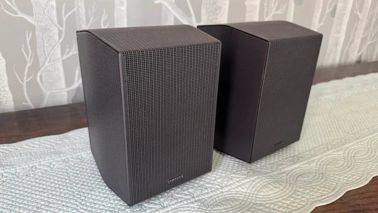 An angled view of the pair of rear speakers included as part of the Samsung HW-Q990F home audio system