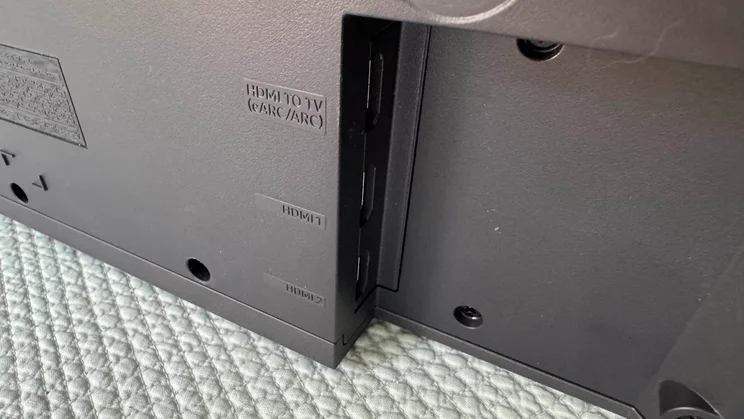 The HDMI connection ports found on the rear of the soundbar component of the Samsung HW-Q990F home audio system